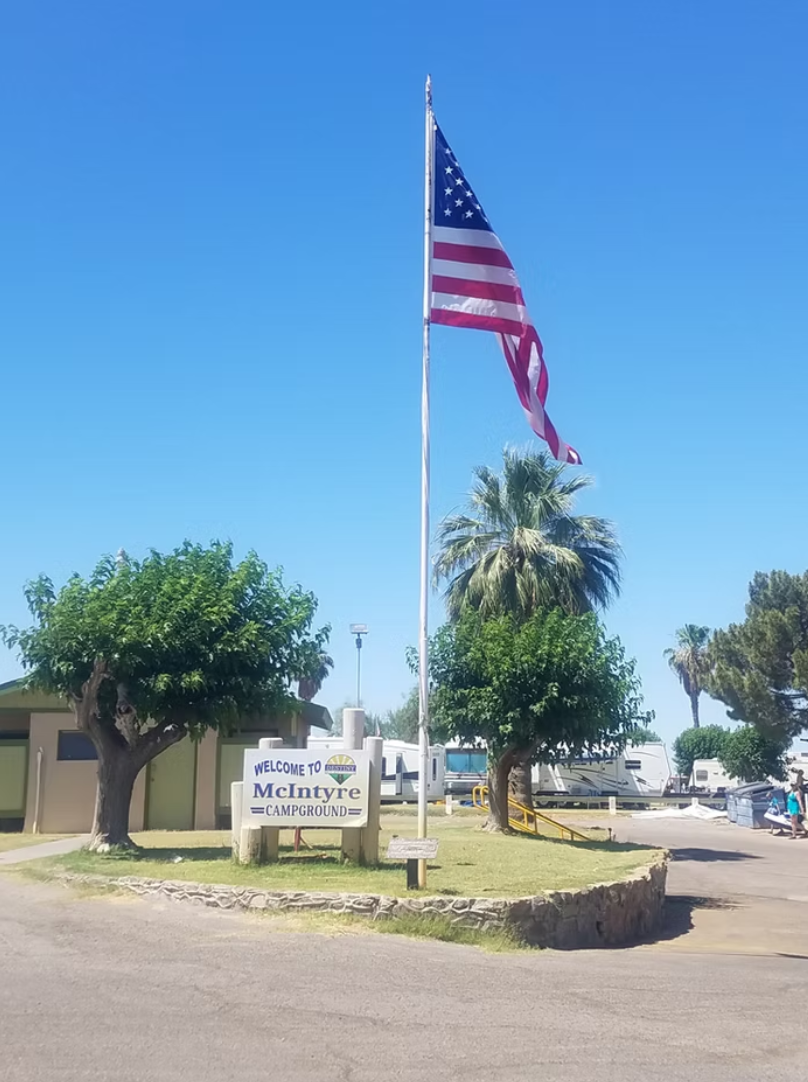 McIntyre RV Resort entrance with American flag
