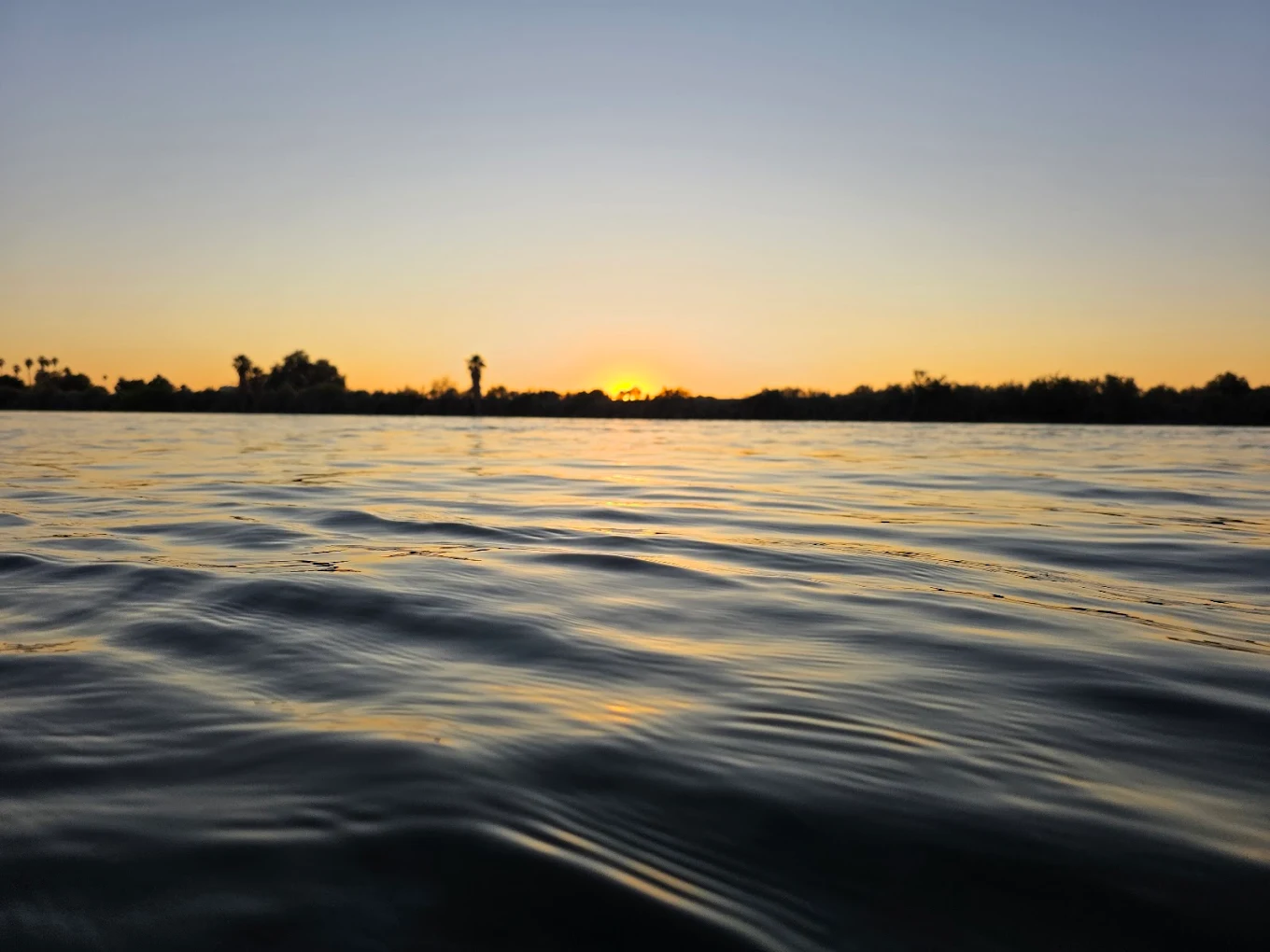Colorado River sunset from the water at McIntyre Resort